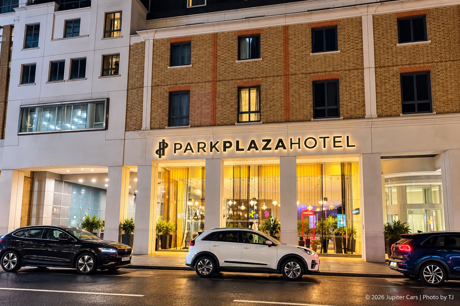 Illuminated Park Plaza Victoria London entrance and hotel frontage at night